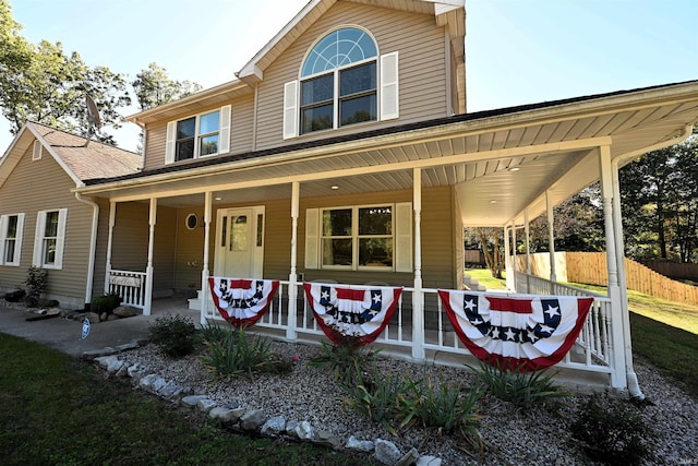 view of front of property featuring covered porch