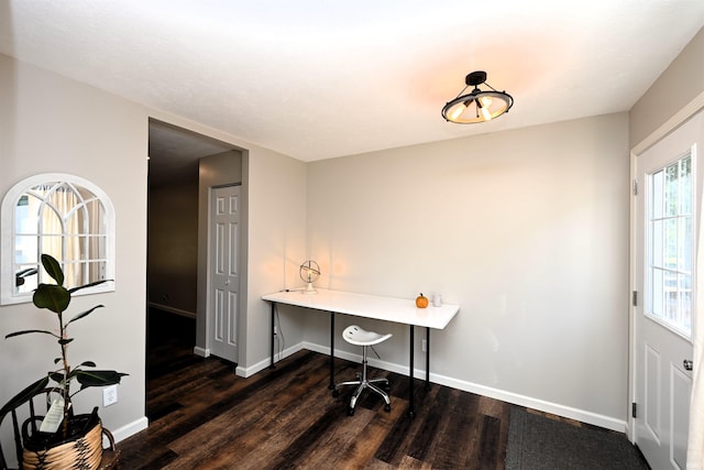 office with dark wood-type flooring