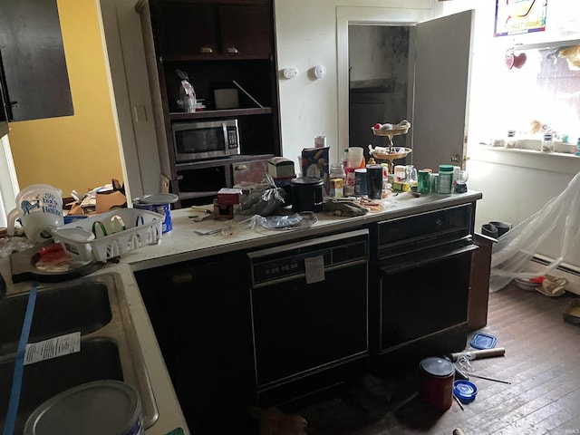 interior space featuring sink and wood-type flooring