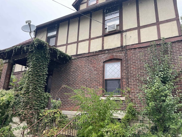 1002 High St, Logansport, IN 46947 - view of home's exterior with brick siding and stucco siding