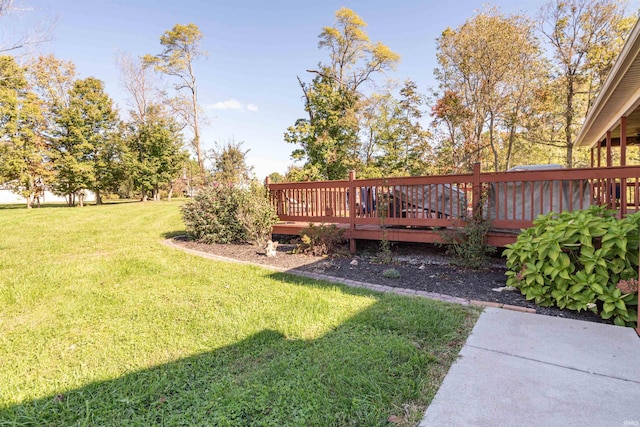 view of yard featuring a deck