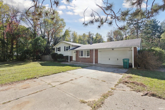 view of front of home with a garage and a front lawn