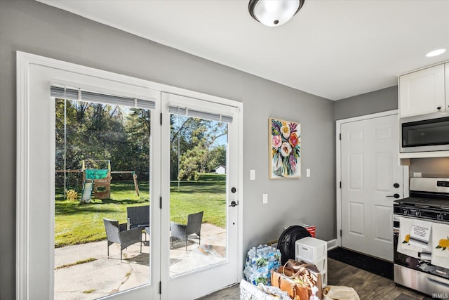 doorway to outside featuring dark hardwood / wood-style floors