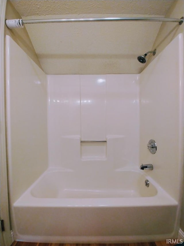 bathroom featuring shower / washtub combination