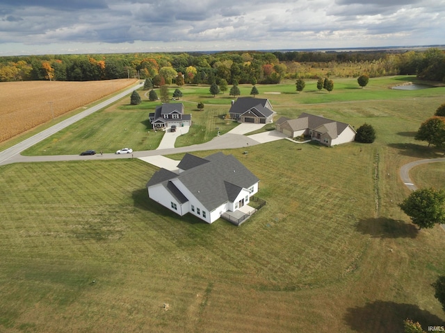 birds eye view of property featuring a rural view