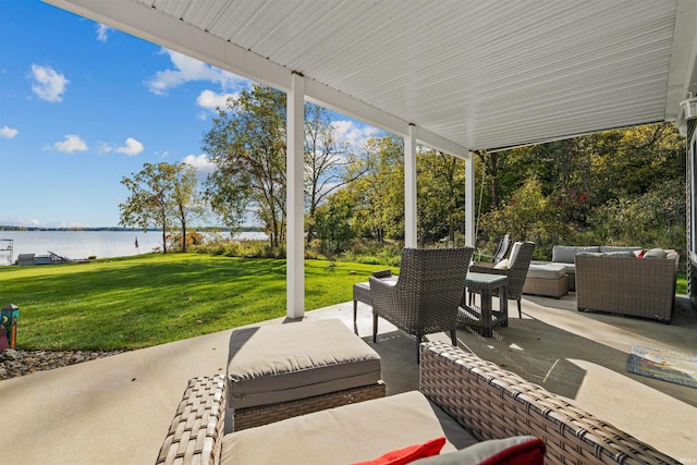 view of patio / terrace with outdoor lounge area and a water view