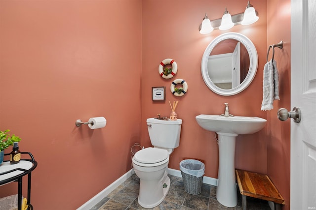 bathroom featuring toilet