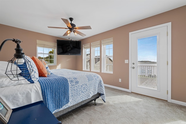 bedroom with access to exterior, carpet, and ceiling fan