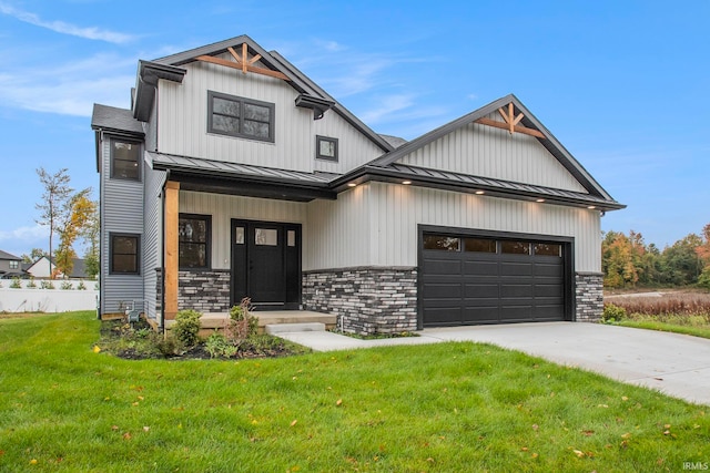 modern farmhouse style home featuring a front lawn and a garage