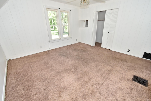 unfurnished room with carpet