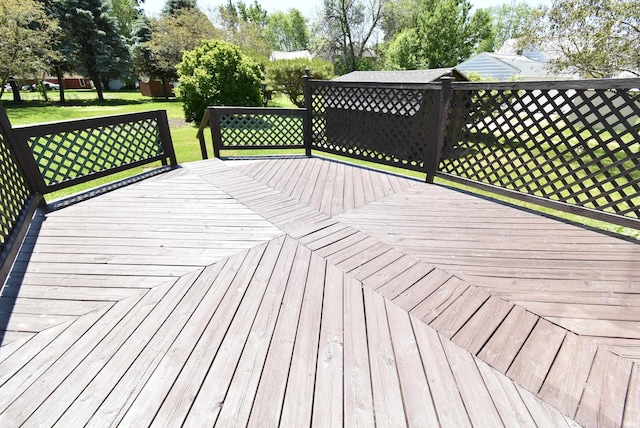 deck featuring a lawn