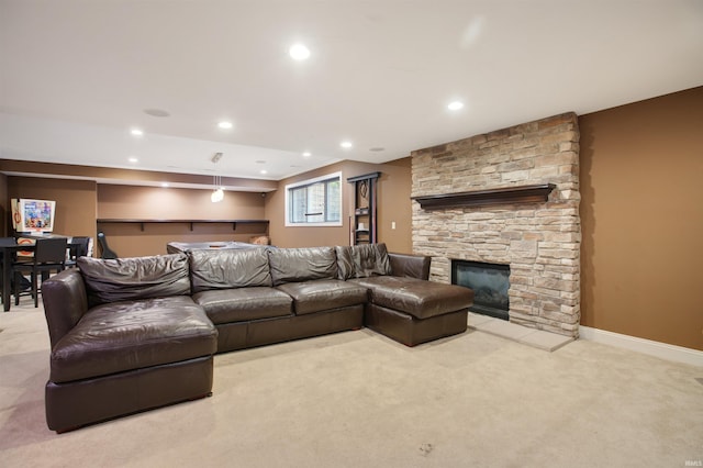 living room with a fireplace and light carpet