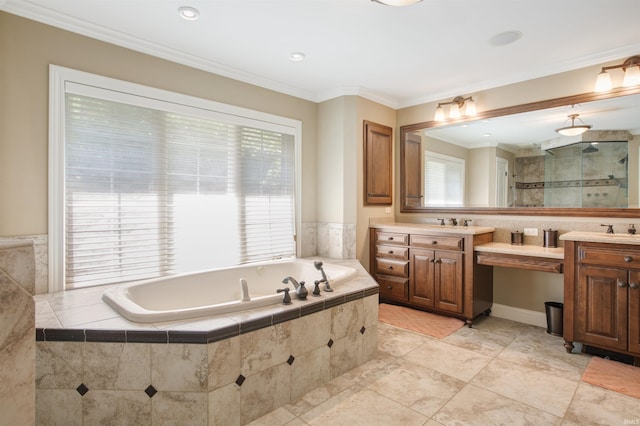 bathroom with vanity, plus walk in shower, crown molding, and a wealth of natural light