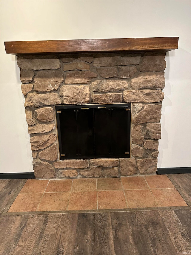 details featuring wood-type flooring and a fireplace