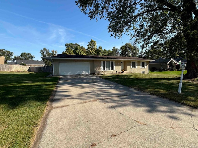 ranch-style house with a front lawn and a garage