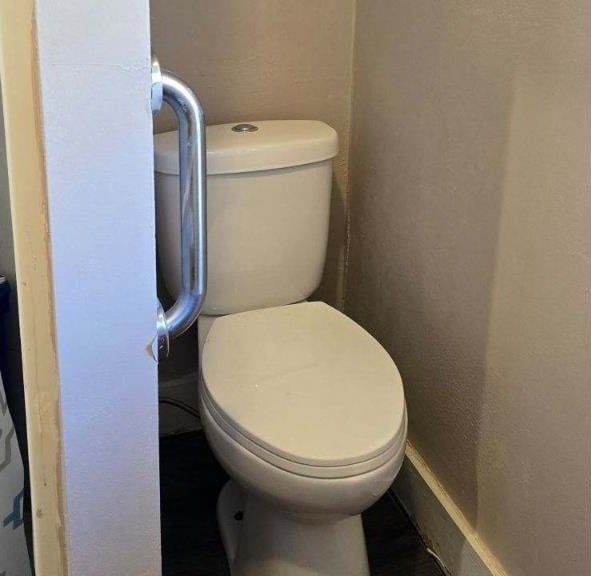 bathroom featuring toilet