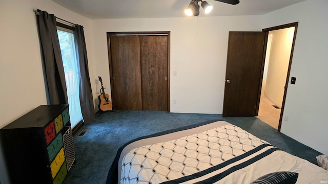 bedroom with light carpet, a closet, and ceiling fan