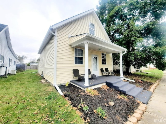 view of front of home featuring a front yard