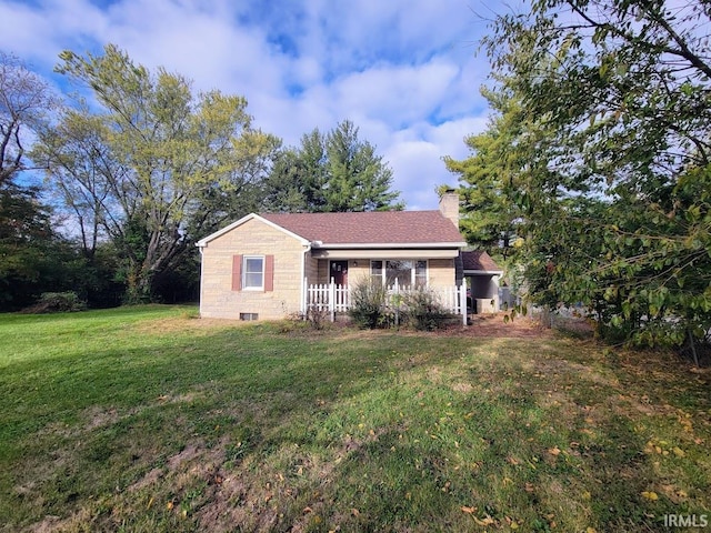 view of front of property with a front lawn