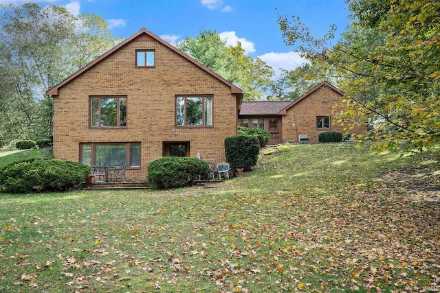 view of side of home featuring a yard