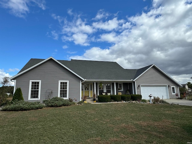 single story home with a front yard, a garage, and covered porch