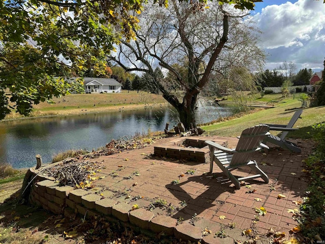 exterior space with a water view