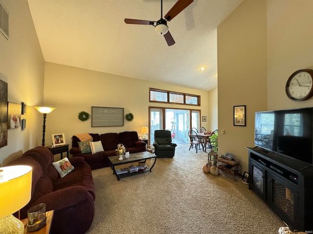 living room with carpet floors, high vaulted ceiling, and ceiling fan