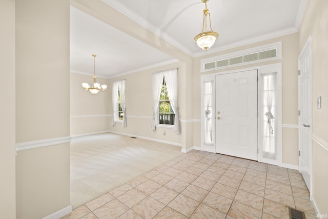 entryway with crown molding, light colored carpet, and a notable chandelier