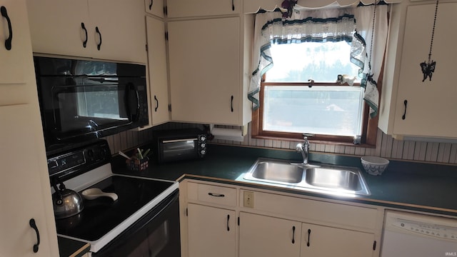 kitchen with white cabinets, sink, and black appliances