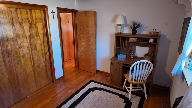 office area with light hardwood / wood-style flooring