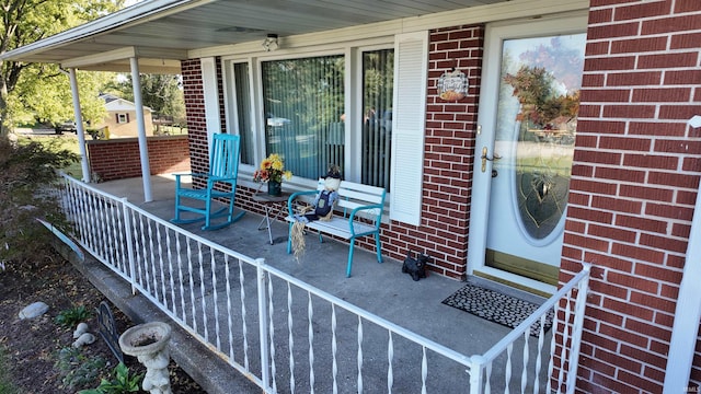 entrance to property with covered porch