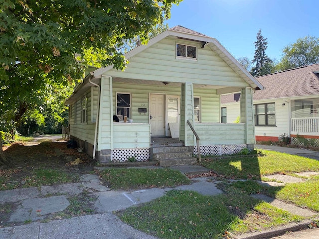 bungalow-style home featuring a porch