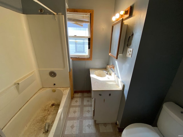 full bathroom featuring toilet, vanity, and shower / washtub combination