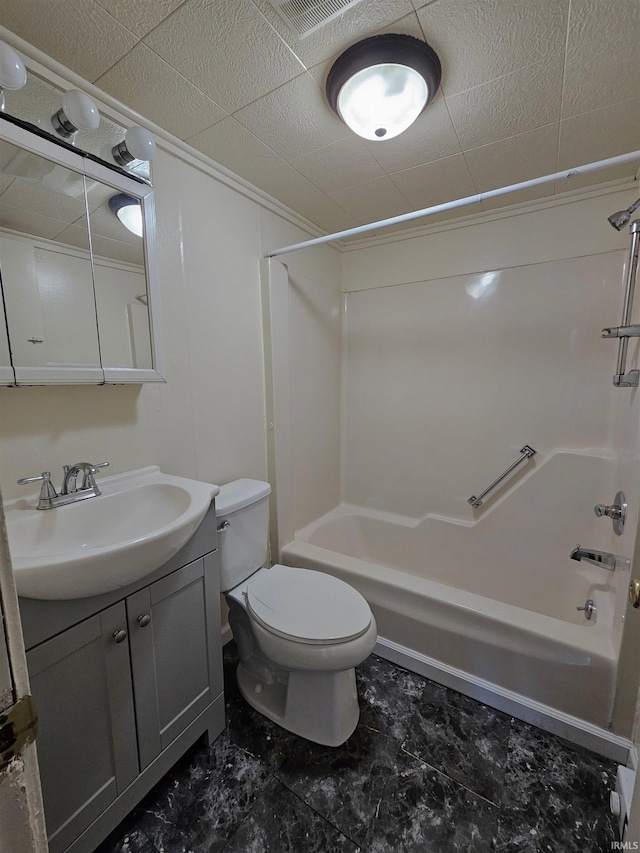 full bathroom featuring shower / bath combination, vanity, and toilet