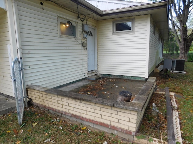 entrance to property with central AC unit