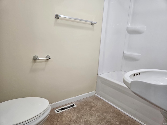 bathroom featuring shower with separate bathtub and toilet