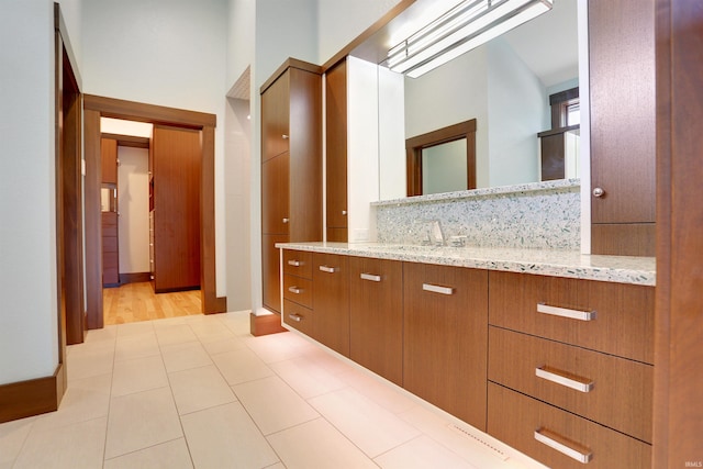 bathroom featuring vanity and tile patterned flooring