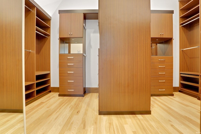 walk in closet featuring light wood-type flooring