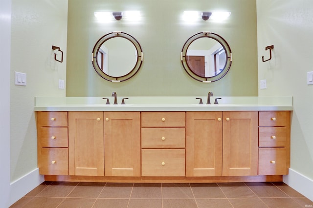 bathroom with vanity and tile patterned flooring