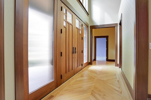 hall with light parquet flooring