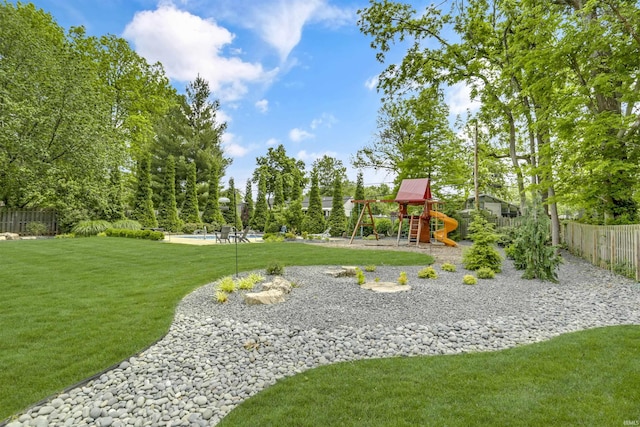 view of jungle gym with a yard