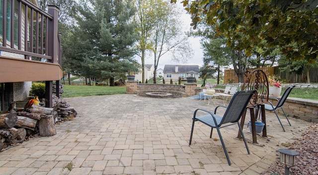 view of patio / terrace with an outdoor fire pit