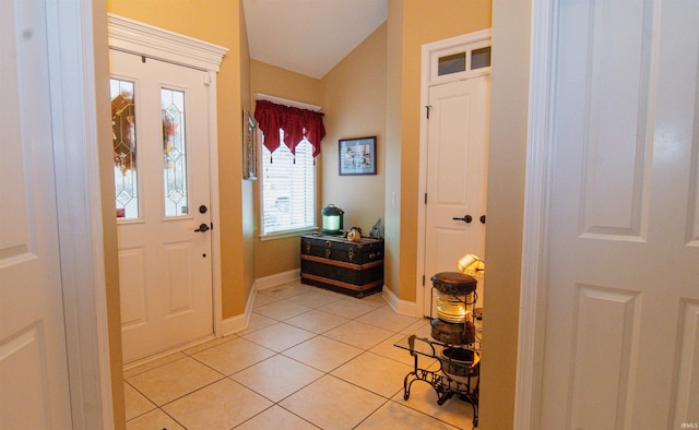 foyer with light tile patterned flooring