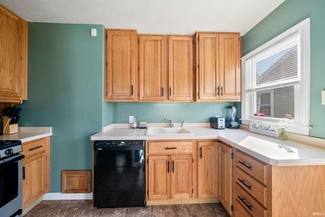 kitchen with dishwasher, stainless steel range oven, and sink