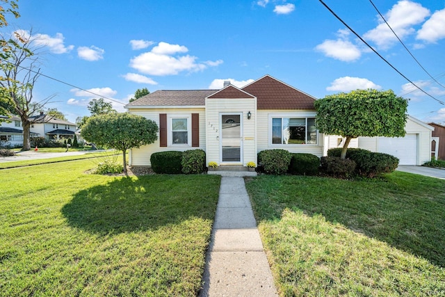 bungalow-style home featuring a front lawn