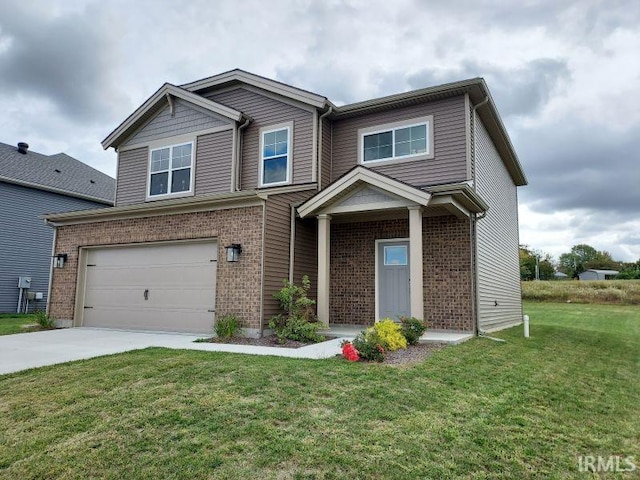 craftsman house featuring a garage and a front lawn