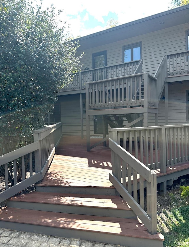 rear view of property with a deck