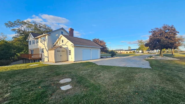 view of property exterior with a storage shed and a lawn