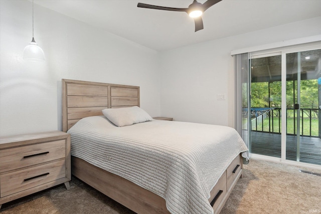 carpeted bedroom featuring ceiling fan and access to exterior