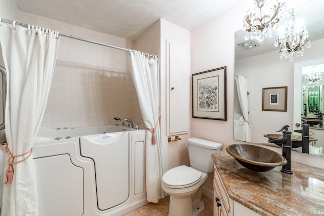 full bathroom with vanity, toilet, shower / bath combination with curtain, and an inviting chandelier